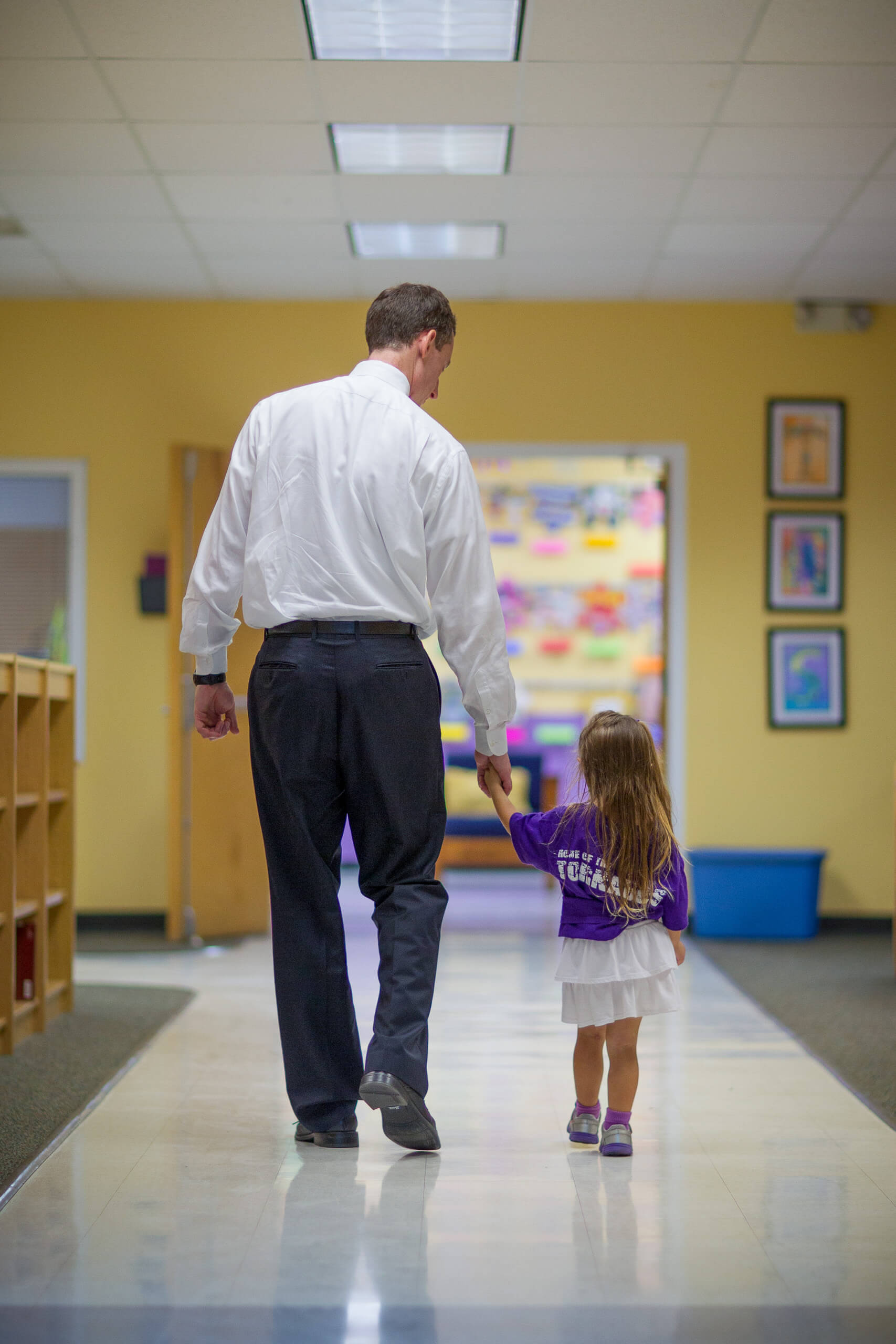 Doug Norry walking with TK student